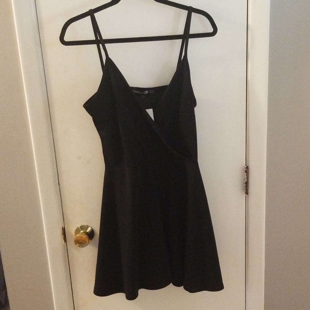 BooHoo Black Romper (12 Tall) small rip on strap